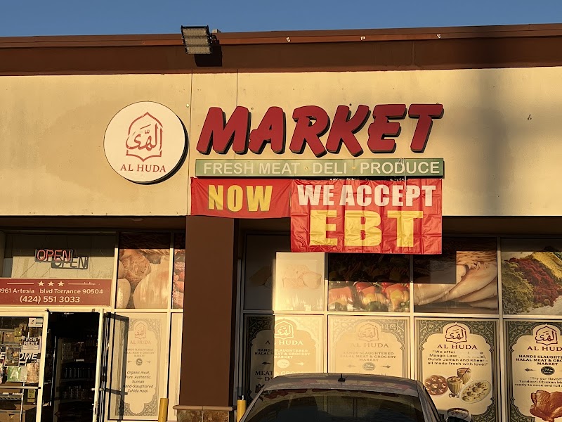Al Huda market logo