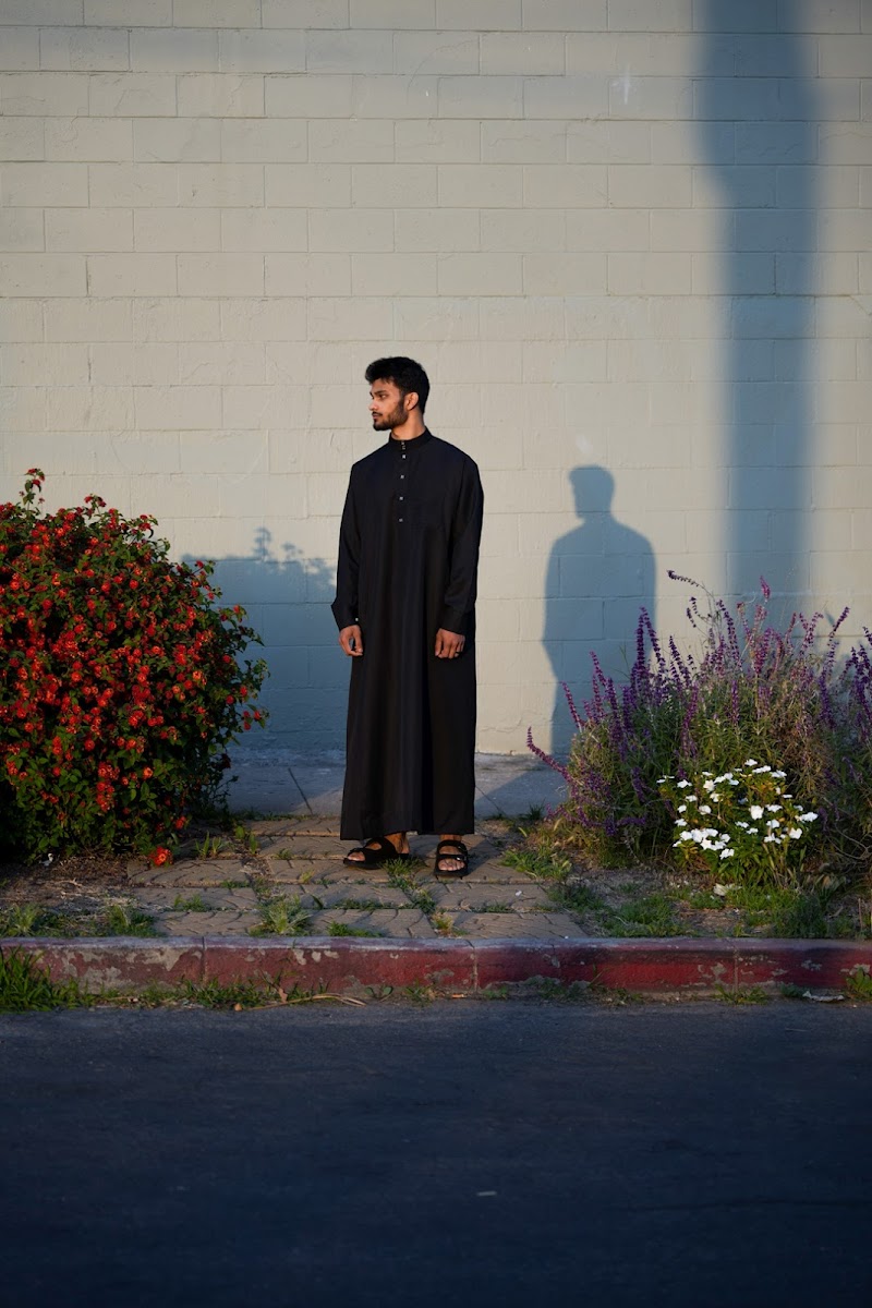 AL Iman Superstore logo