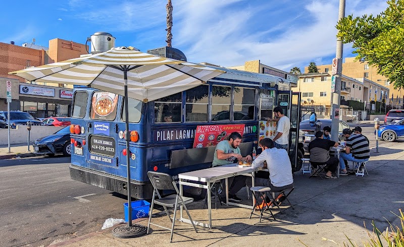 Lazzat Halal Foods logo