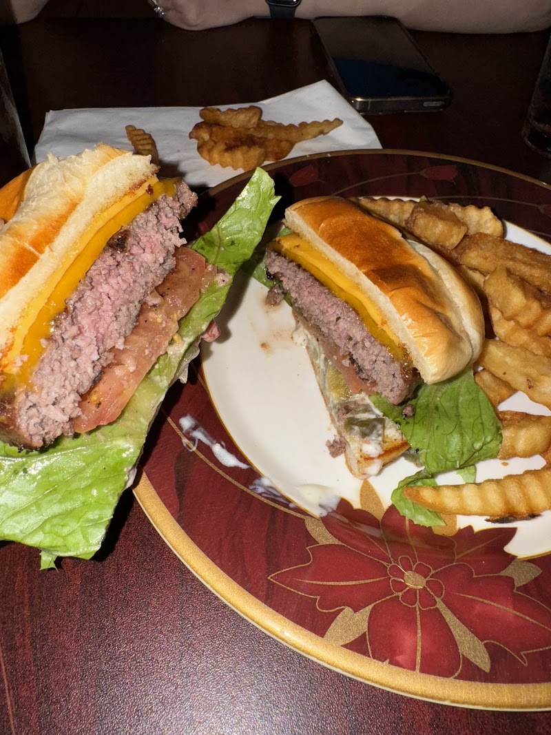 The Halal Burger (Inside Seven Restaurant) logo