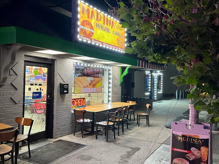 MADINA HALAL GRILL logo