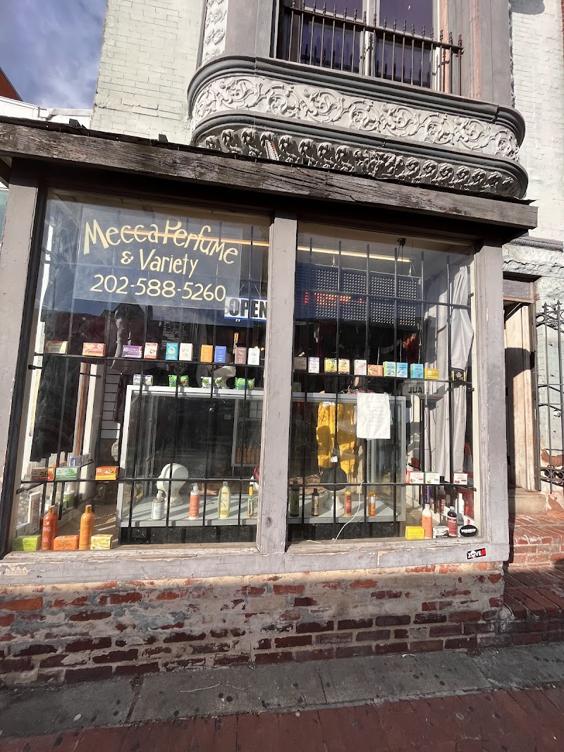 Mecca Perfume & Bookstore logo